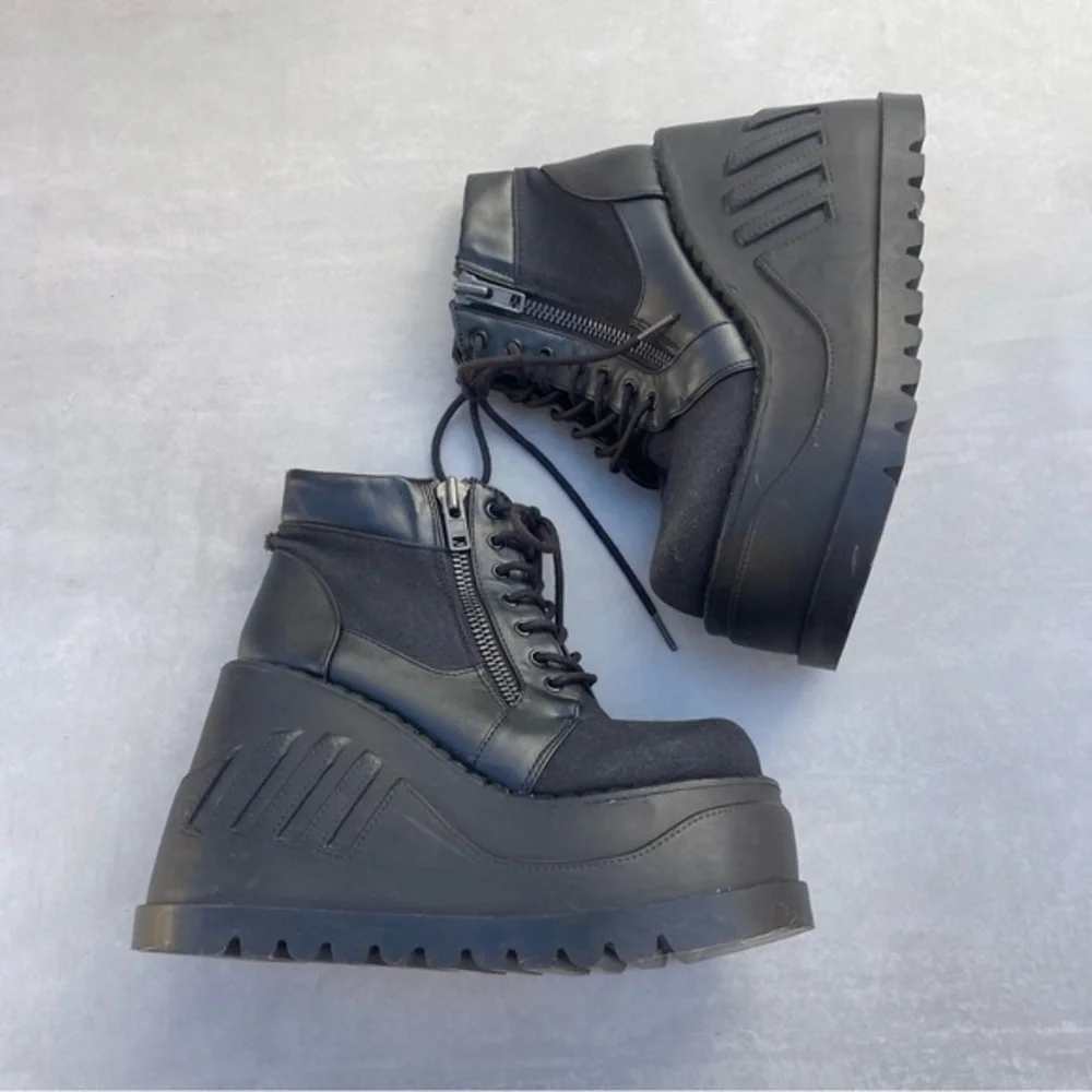 Demonia STOMP-10 Wedge Platform Lace-Up Bootie in Black Canvas